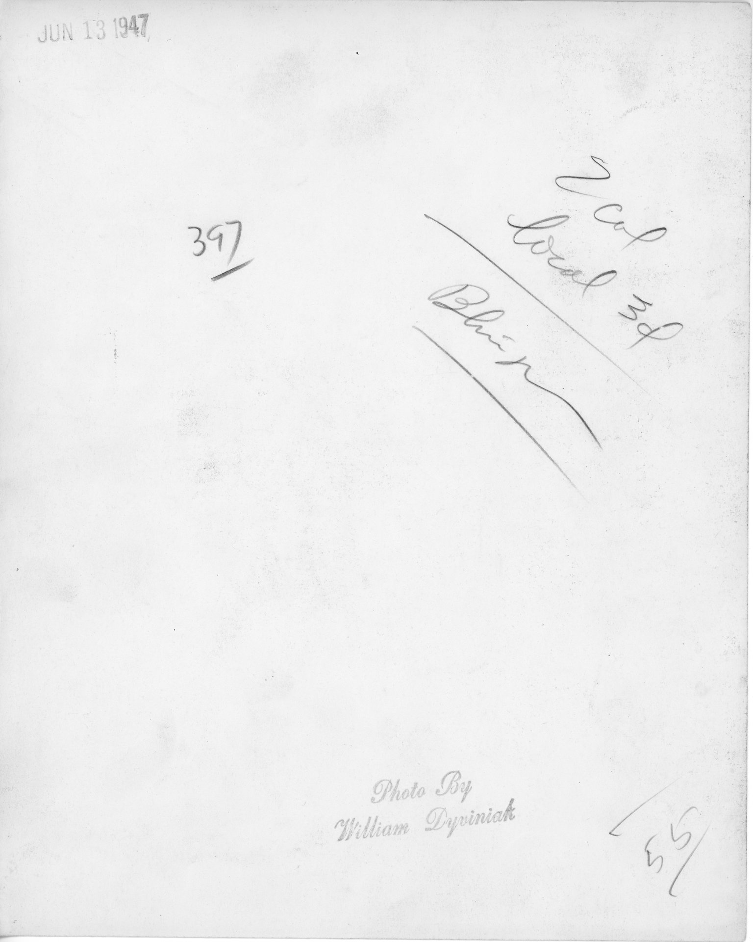 The back side of the above photo dating the picture to June 13, 1947.