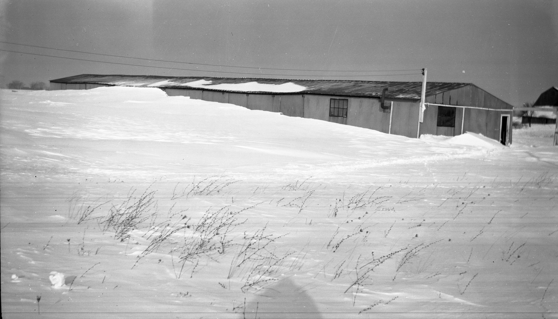 Tony Riccio's maintenance shop in the South end of the horse stable at the Gardenville Airport during the winter season.