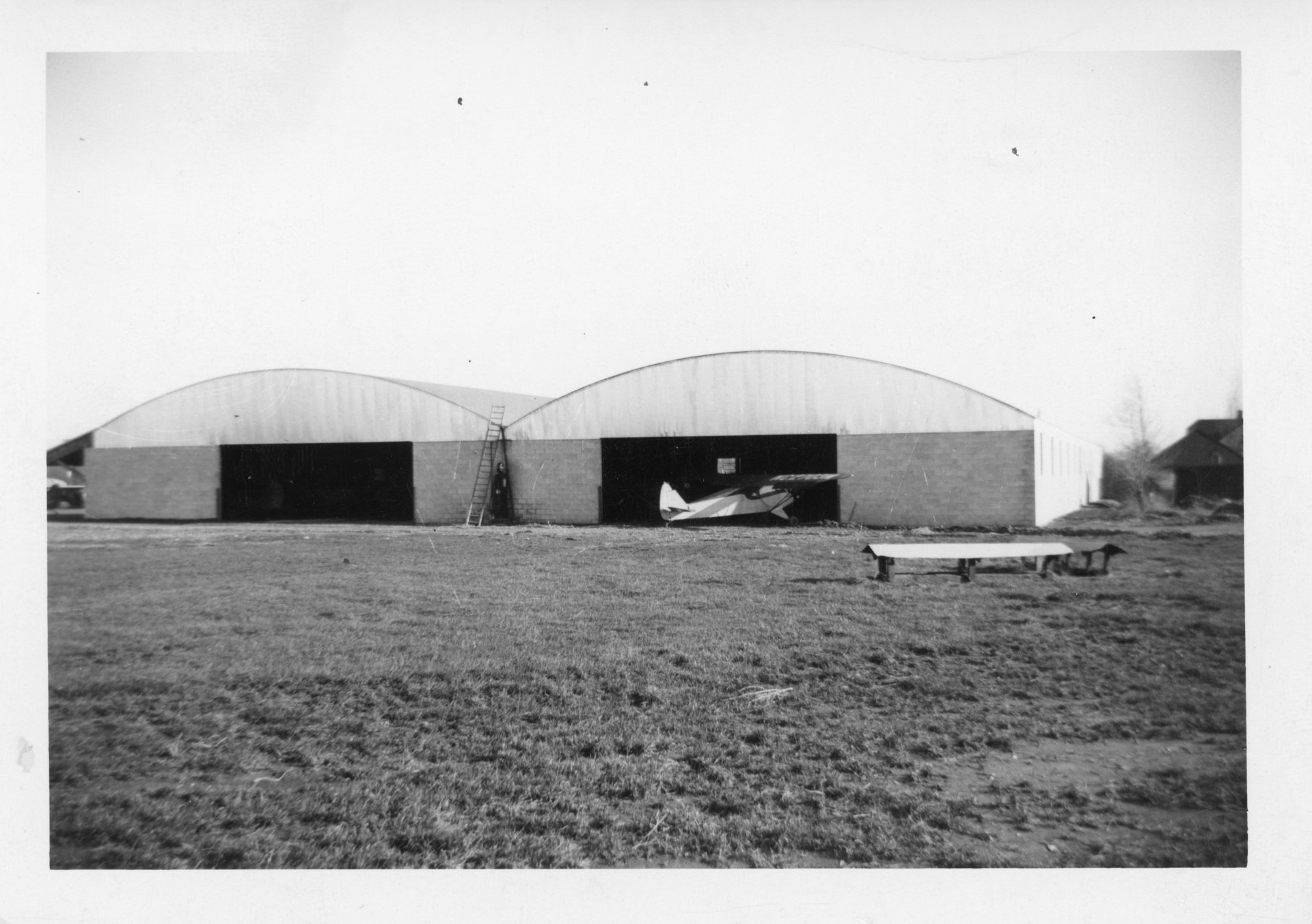The finished construction of the Twin hangars at Buffalo Airpark in 1951.