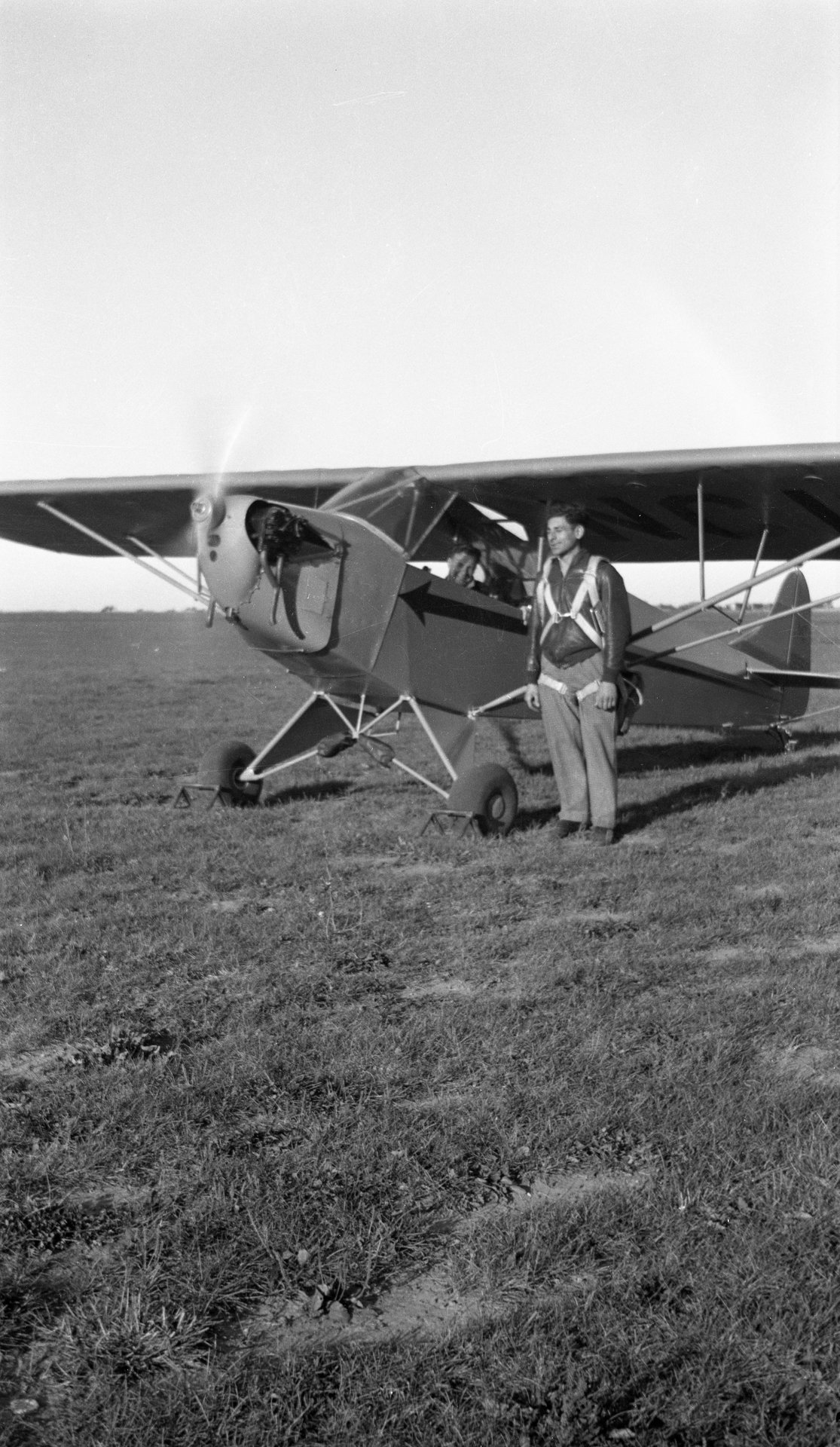Tony Riccio standing next to a running Tayler "Cub" J-2.