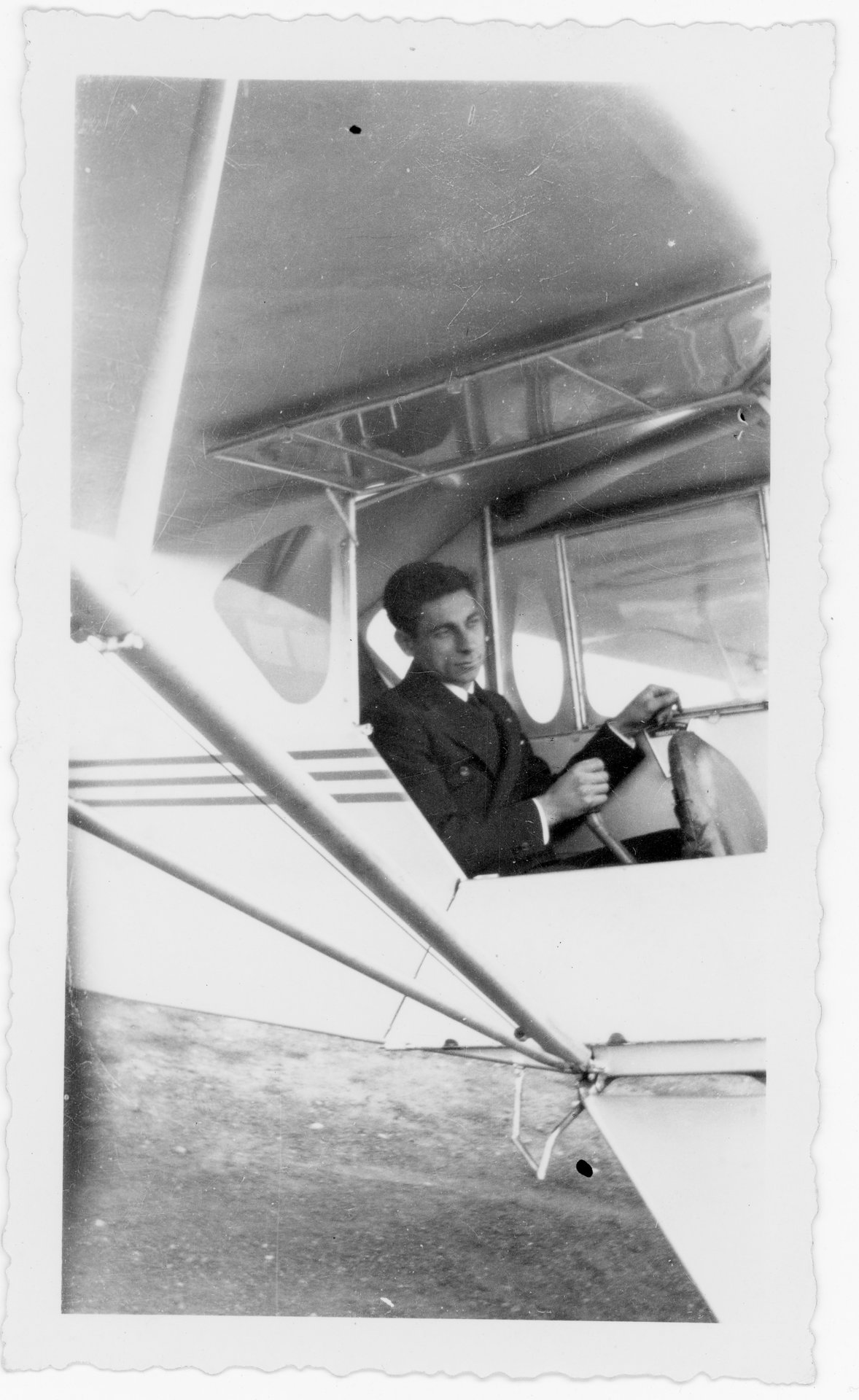 Tony Riccio sitting in the pilot's seat of his J-3 "Cub".