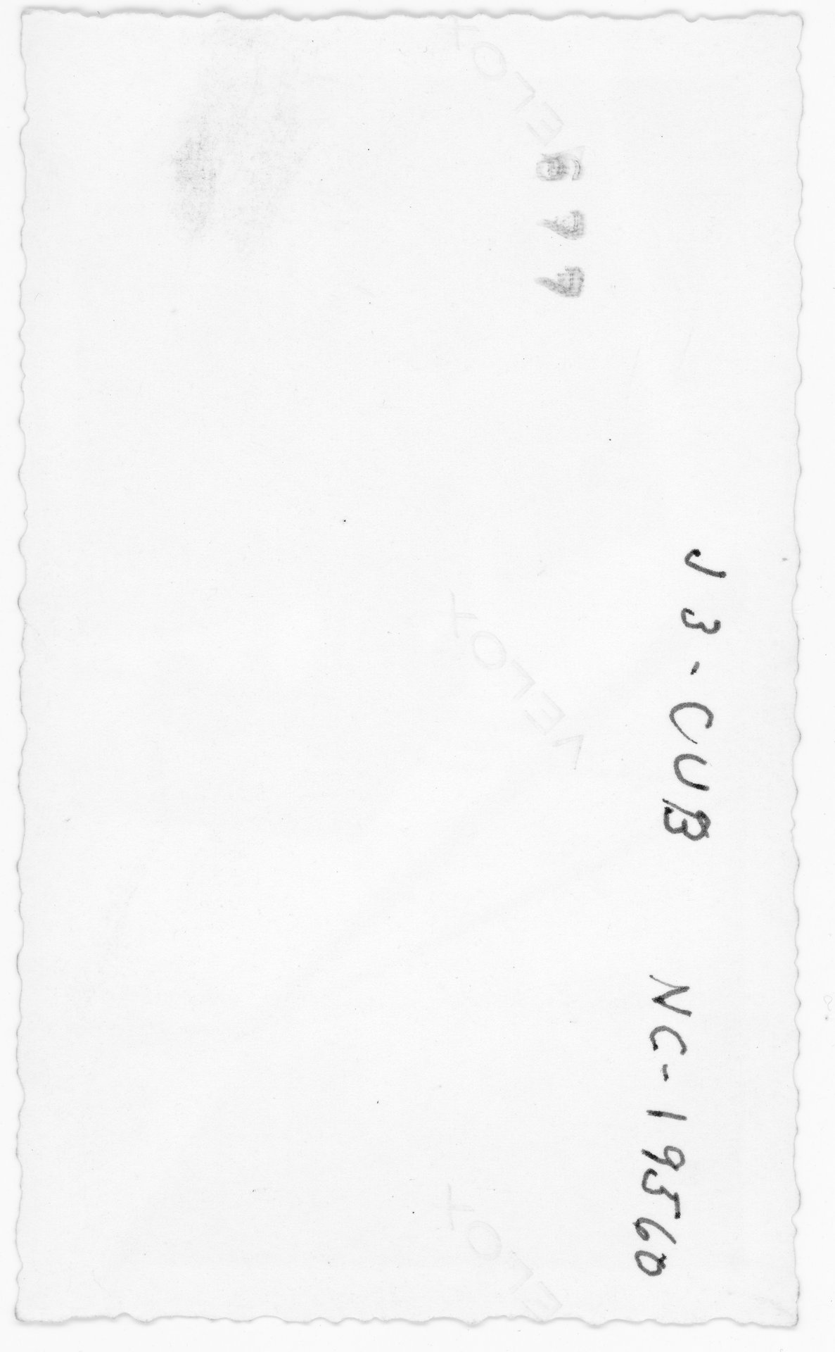 The back side of the above photo where Tony Riccio identified the airplane as his J-3 "Cub". (NC-19560)