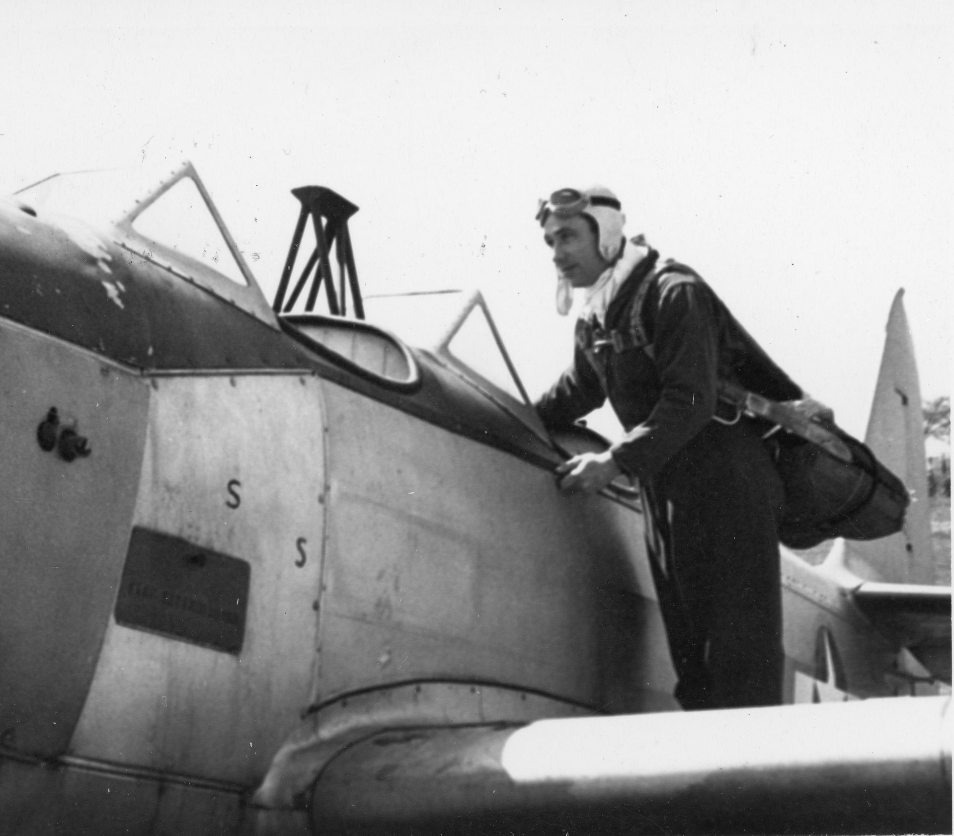 Tony Riccio climbing into a Fairchild PT-19 for a training flight.