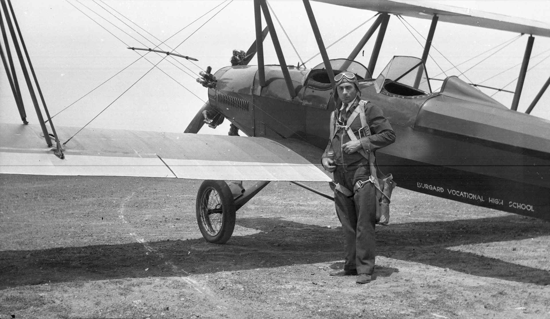 Tony Riccio standing next to an Alexander Eaglerock, A-15, owned by the Burgard Vocational High School.
