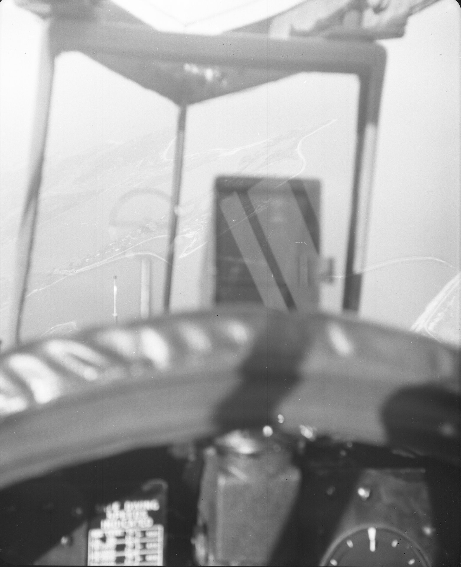 I always wondered about the view looking out the front of a P-47 canopy. Now I know.